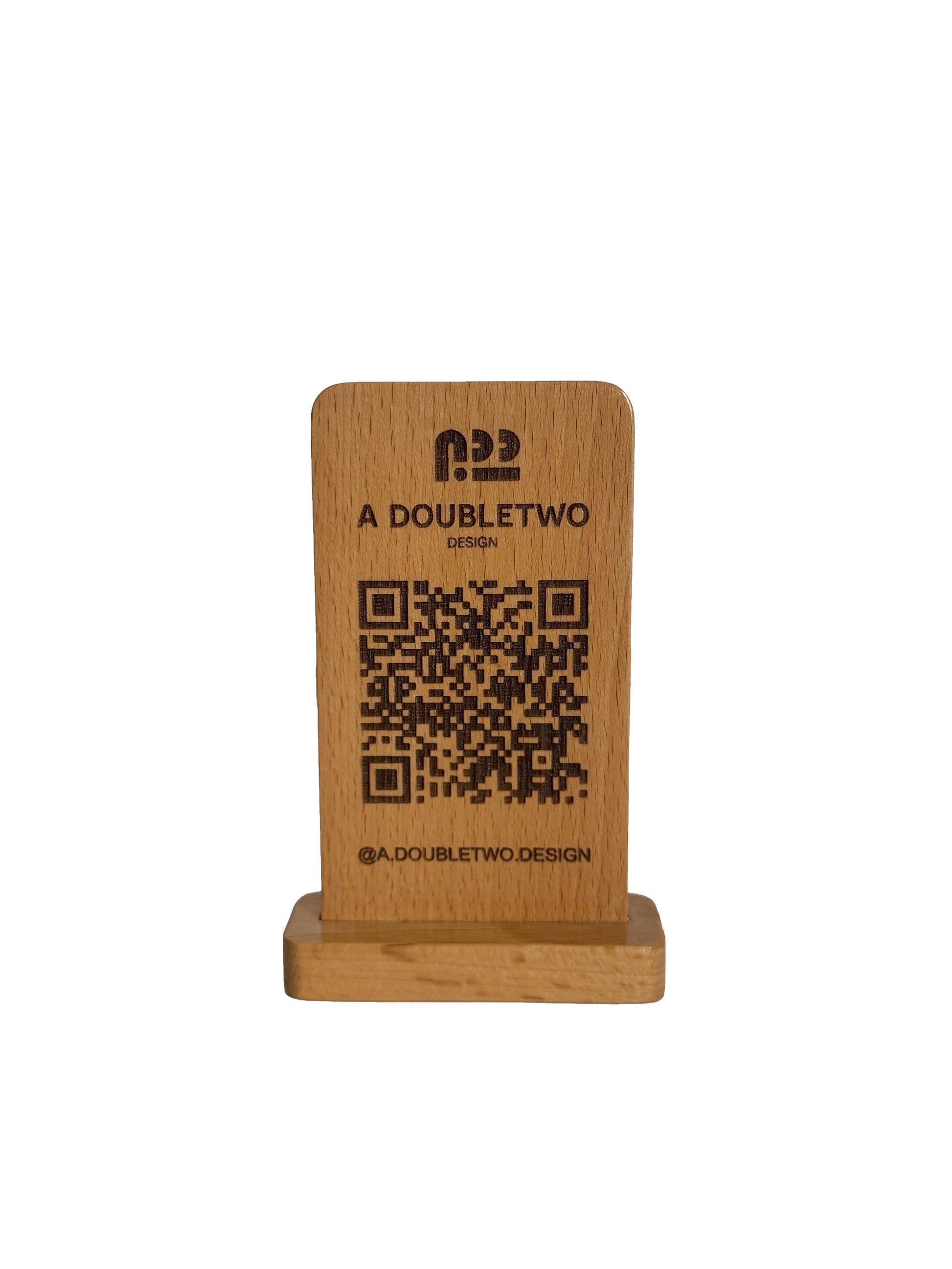 Wooden phone stand with QR code and branding on a white background